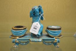 A French turquoise glazed figural ink stand.