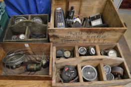 Old storage boxes containing various dials etc.
