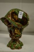 An unusual moulded majolica vase on naturalistic form.
