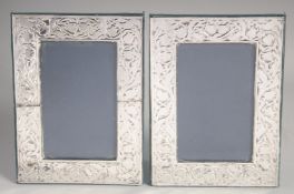 A PAIR OF PLAIN SILVER UPRIGHT PHOTOGRAPH FRAMES embossed with harebells. 8ins x 5.5ins. London