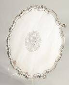 A SUPERB GEORGE II SILVER SALVER by JOHN TWITE, with pie crust border and engraved crest,
