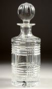 A RALPH LAUREN CIRCULAR CUT GLASS DECANTER AND STOPPER