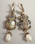 A PAIR OF SCARAB DESIGN DROP EARRINGS.