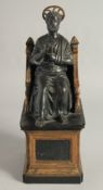 AFTER THE ANTIQUE. A 19TH CENTURY BRONZE SAINT SITTING ON A THRONE 14ins high.