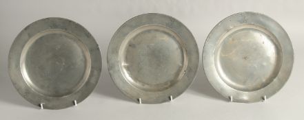 THREE EARLY PEWTER PLATES, Griffin Crown Crest. 9.5ins diameter.