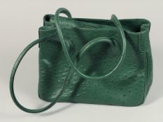 A FRANCHETTI BOND OSTRICH SKIN BAG 11ins x 8 ins with two leather handles.