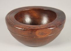 A TREEN PESTLE. 6.5ins diameter.