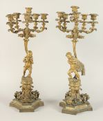 A GOOD PAIR OF 19TH CENTURY FRENCH ORMOLU SIX LIGHT CANDELABRAS with dwarf figures on a base with