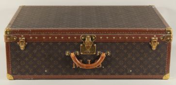 A LARGE LOUIS VUITTON SUITCASE. No. 1023430. With Louis Vuitton label. Lock no. 1252082. 31.5ins
