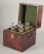 A GOOD GEORGIAN SQUARE MAHOGANY DECANTER BOX AND COVER with brass carrying handle and filled with