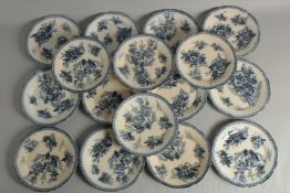 A SET OF SIXTEEN FLOW BLUE DINNER PLATES. 9ins diameter.