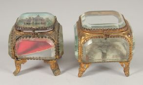 TWO GOOD SQUARE GLASS AND GILT JEWELLERY BOXES, one Torino, 1911. 2.5ins square.