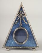 A KITNEY &CO. RUSSIAN DESIGN SILVER AND ENAMEL TRIANGULAR PHOTOGRAPH FRAME. 5ins x 3.5ins in a