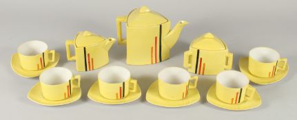 AN ART DECO YELLOW TEA SET, comprising large tea pot, small tea pot, sugar bowl, six cups and