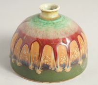 A CHINESE DRIP GLAZE CIRCULAR PORCELAIN BEEHIVE BRUSH POT. 4.5ins diameter.