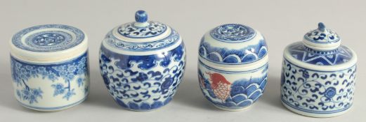 FOUR CHINESE BLUE AND WHITE PORCELAIN TEA CADDIES.