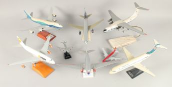 A COLLECTION OF EIGHT PLASTIC AND METAL AEROPLANES.