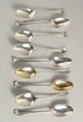 A COMPOSITE SET OF NINE EARLY GEORGIAN SILVER RAT TAIL DESSERT SPOONS. London 1729 and other