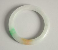 A JADE BANGLE.