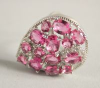 A SILVER AND GEMSTONE TEAR DROP RING.