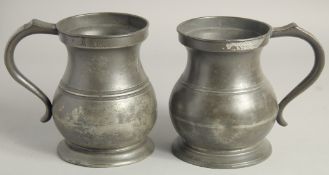 TWO PEWTER QUART TANKARDS 6ins high.
