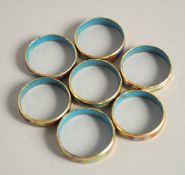 SEVEN CLOISONNE ENAMEL RINGS.