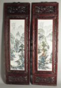 A PAIR OF LONG FRAMED CHINESE WALL PLAQUES.