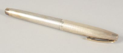 A SILVER OVERLAY SHAEFFER PEN.