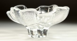 AN ORREFORS SHAPED GLASS DISH as a flower head. 6.25ins diameter x 3ins high.