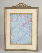 AN UPRIGHT GILDED PHOTOGRAPH FRAME. 6.5ins x 6ins.