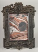 A GOOD VICTORIAN BLACK UPRIGHT PHOTOGRAPH FRAME. 10ins x 6ins.