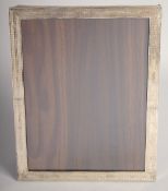 A SILVER UPRIGHT PHOTOGRAPH FRAME. 10ins x 8ins.