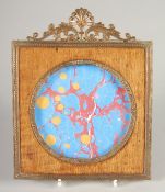 A SQUARE EMPIRE GILDED AND WOOD PHOTOGRAPH FRAME. 6.5ins x 5.5ins