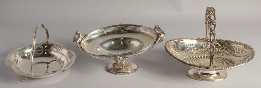 THREE SWING HANDLE SILVER PLATE CAKE BASKETS.