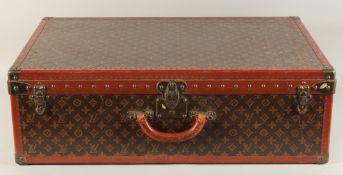 A LARGE LOUIS VUITTON SUITCASE. No. 847181. With Louis Vuitton label. Lock no. 105394. 31.5ins
