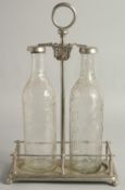 AN IDRIS OF LONDON TWO BOTTLE CORDIAL TANTALUS.