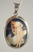 A SILVER AND ENAMEL NUDE PENDANT.