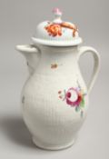 A GOOD COFFEE POT AND COVER painted with flowers. 11ins high.
