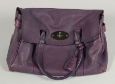 A LARGE MULBERRY MAUVE SOFT LEATHER BAG. 14ins x 10.5ins with two leather handles.
