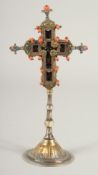 A SMALL 17TH -18TH CENTURY SILVER GILT CROSS enclosing a coral crucifix, with inscriptions and dated