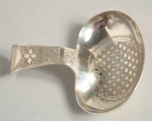 A GEORGE III SILVER ENGRAVED CADDY SPOON. Birmingham 1809.