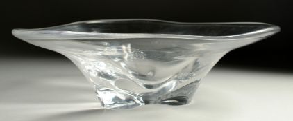A LARGE ORREFORS SHAPED PLAIN GLASS PEDESTAL DISH. Signed No. 3516/10. 13ins wide x 4ins high.