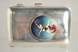 AN ENGRAVED TURNED CIGARETTE CASE. Birmingham, 1928 with enamel dancer.
