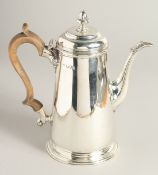 A GOOD VICTORIAN SILVER TAPERING COFFEE POT with wooden handle. London 1893. Weight 20ozs.