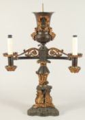 THOMAS MESSENGER. A REGENCY BRONZE AND ORMOLU TWO LIGHT CANDELABRA with outstretched arms and an urn
