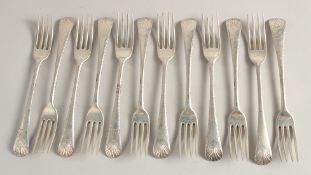 A SET OF 12 IRISH SILVER SHELL PATTERN DESSERT FORKS. Dublin 1775. Maker M. K.