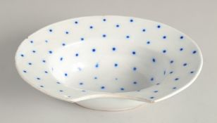 AN EARLY BLUE SPOTTED MAJOLICA BARBER'S BOWL. 10.5ins wide.
