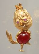 AN 18CT GOLD DUCK BY FRASCAROLO with large cabochon ruby. Signed. 16g.
