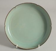 A CHINESE RU STYLE CELADON PETAL FORM BOWL, 19.5cm diameter.