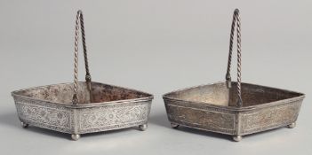 A PAIR OF 19TH CENTURY PERSIAN QAJAR SIGNED SILVER BASKETS, weight 290g, 14cm wide.